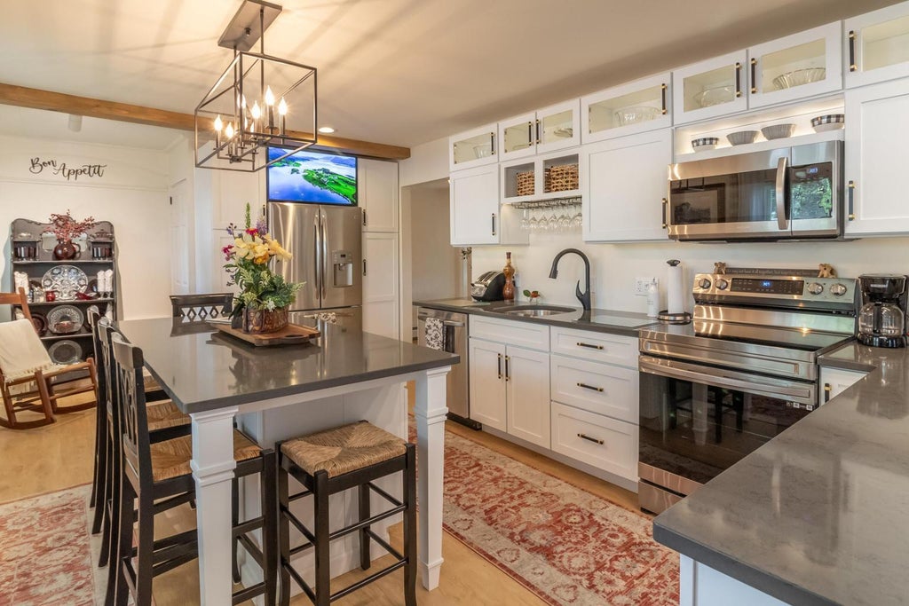 Photo of 13 Elm Street, Guilford, ME 04443 (MLS # 1665443)