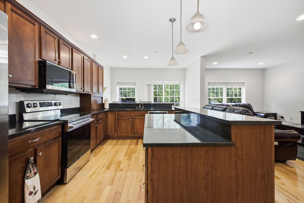 Photo of 42 Harvest Hill Lane #11, Auburn, ME 04210 (MLS # 1680125)
