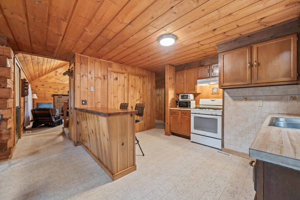 Photo of 303 Quimby Pond Road, Rangeley, ME 04970 (MLS # 1684268)