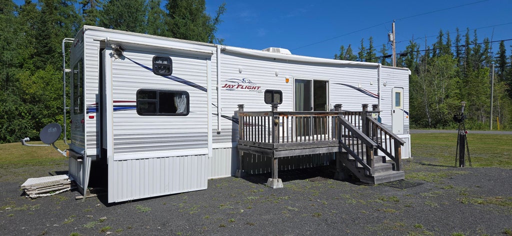 Photo of 3563 Caribou Road, Cross Lake Twp, ME 04779 (MLS # 1675580)