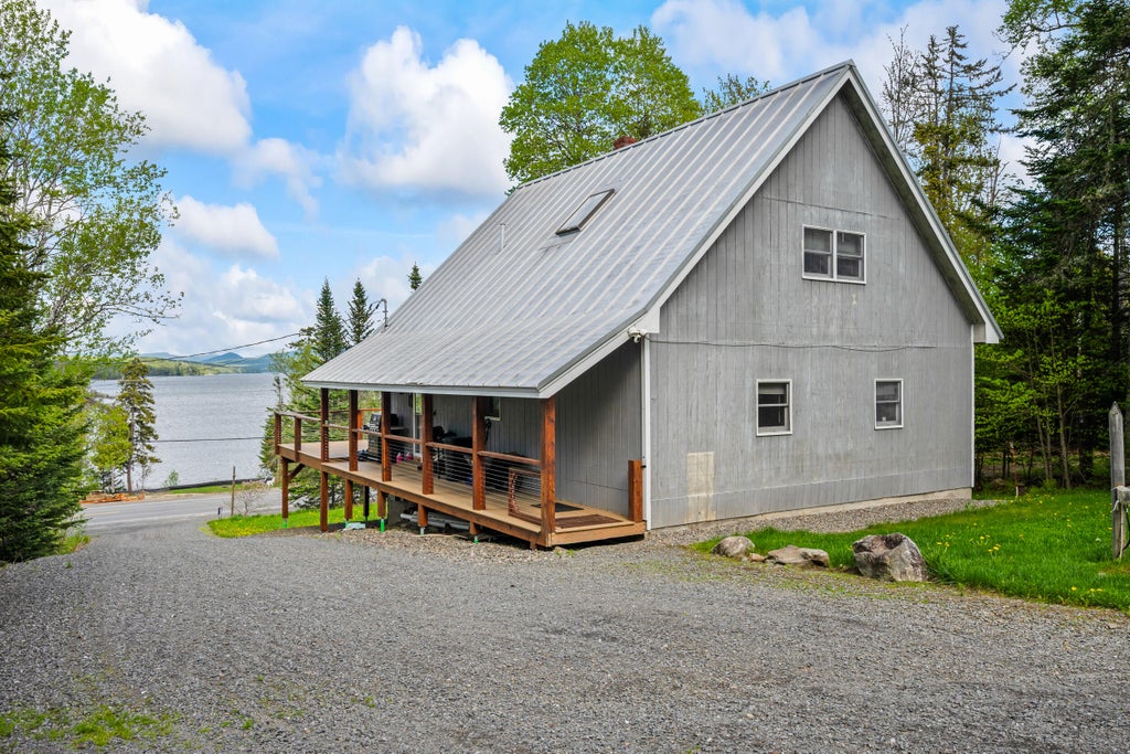 Photo of 303 Rumford Road, Rangeley, ME 04970 (MLS # 1657550)