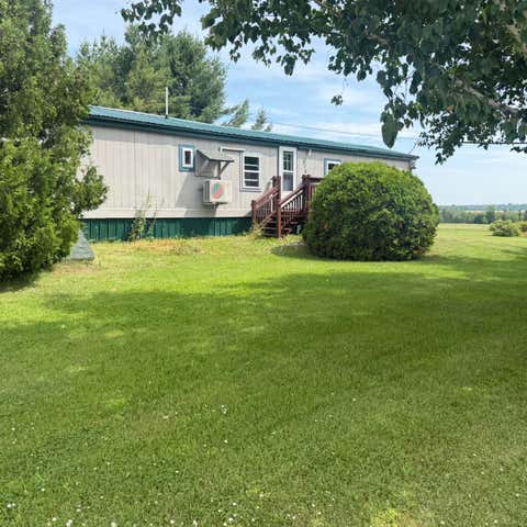 Photo of 176 Caribou Lake Road, Washburn, ME 04786 (MLS # 1673042)