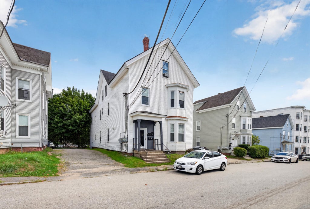Photo of 139 Oak Street, Lewiston, ME 04240 (MLS # 1678447)
