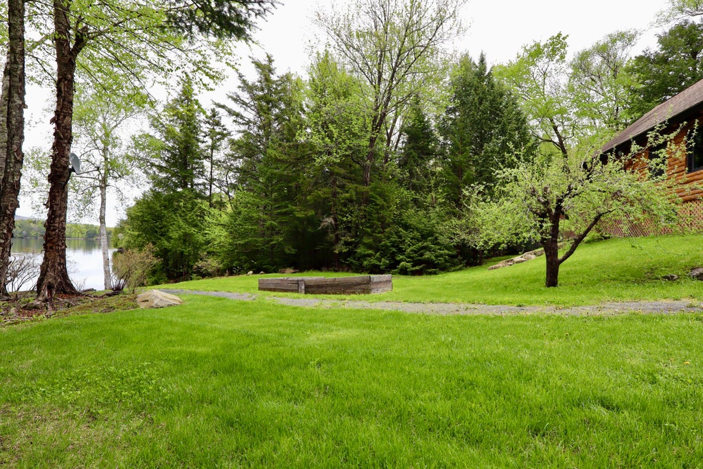 Photo of 567 Big Moose Pt Road, Big Moose Twp, ME 04442 (MLS # 1663846)