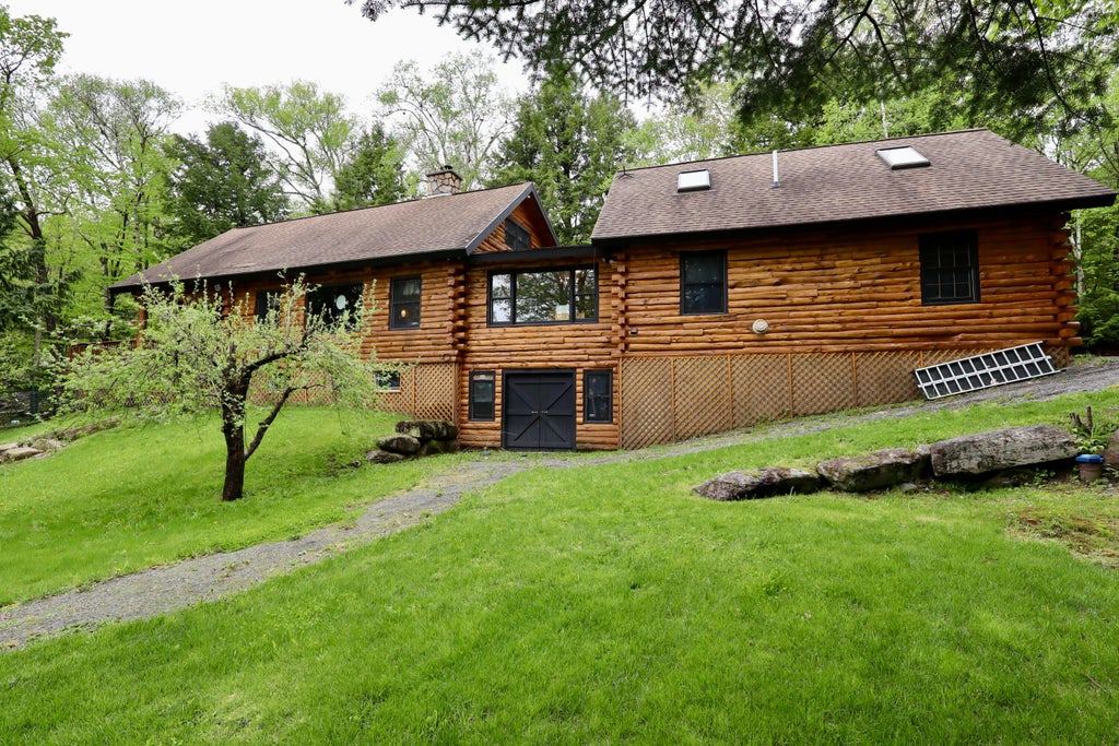 Photo of 567 Big Moose Pt Road, Big Moose Twp, ME 04442 (MLS # 1663846)