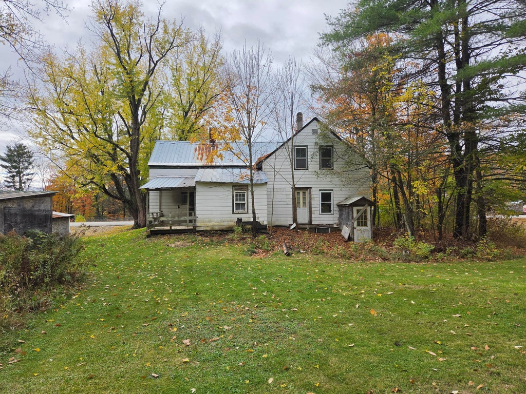 Photo of 449 E Dixfield Road, Jay, ME 04239 (MLS # 1684618)