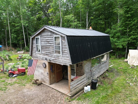 Photo of 135 Clearcut Lodge Road, Springfield, ME 04487 (MLS # 1671218)
