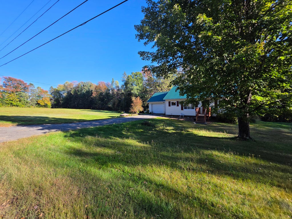 Photo of 73 Frenchs Mill Road, Sangerville, ME 04479 (MLS # 1681516)