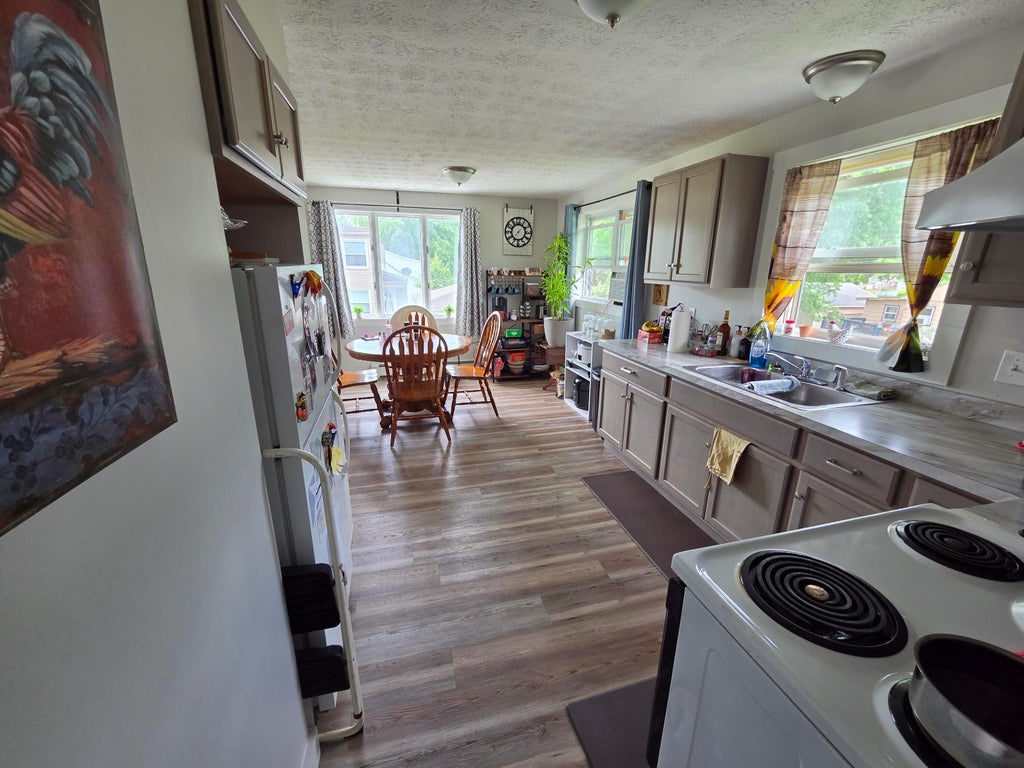 Photo of 79 Dow Avenue, Lewiston, ME 04240 (MLS # 1671166)