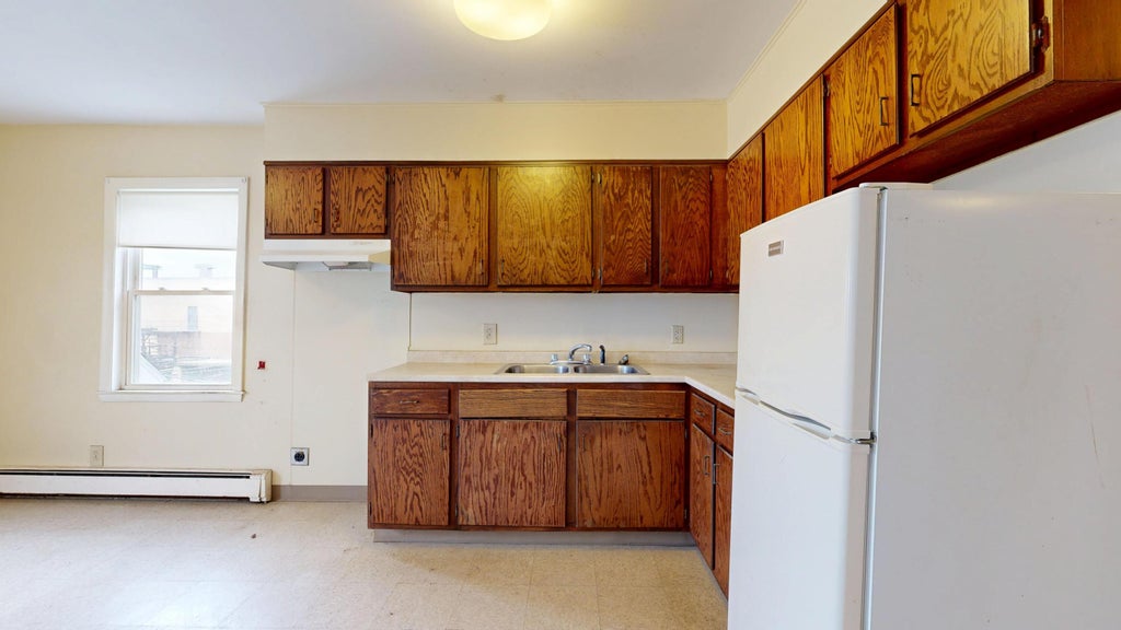 Photo of 212 Park Street, Lewiston, ME 04240 (MLS # 1683086)