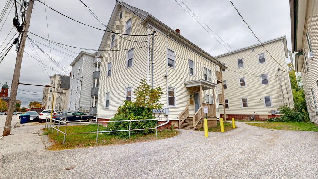 Photo of 212 Park Street, Lewiston, ME 04240 (MLS # 1683086)