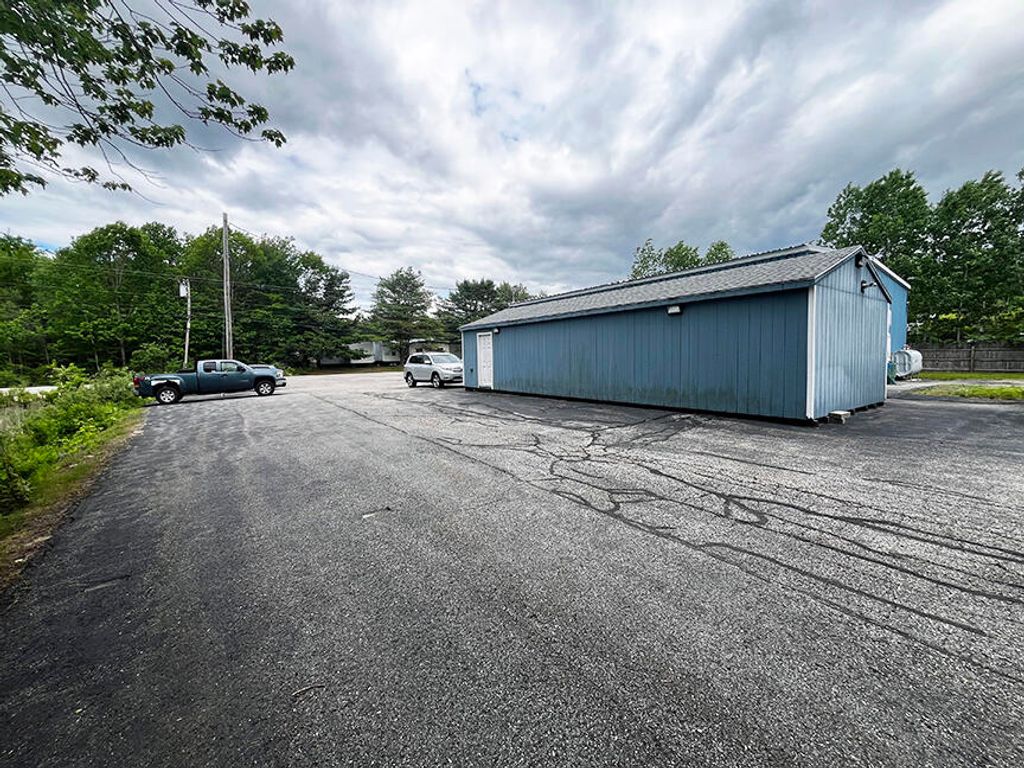 Photo of 328 Rodman Road, Auburn, ME 04210 (MLS # 1665712)