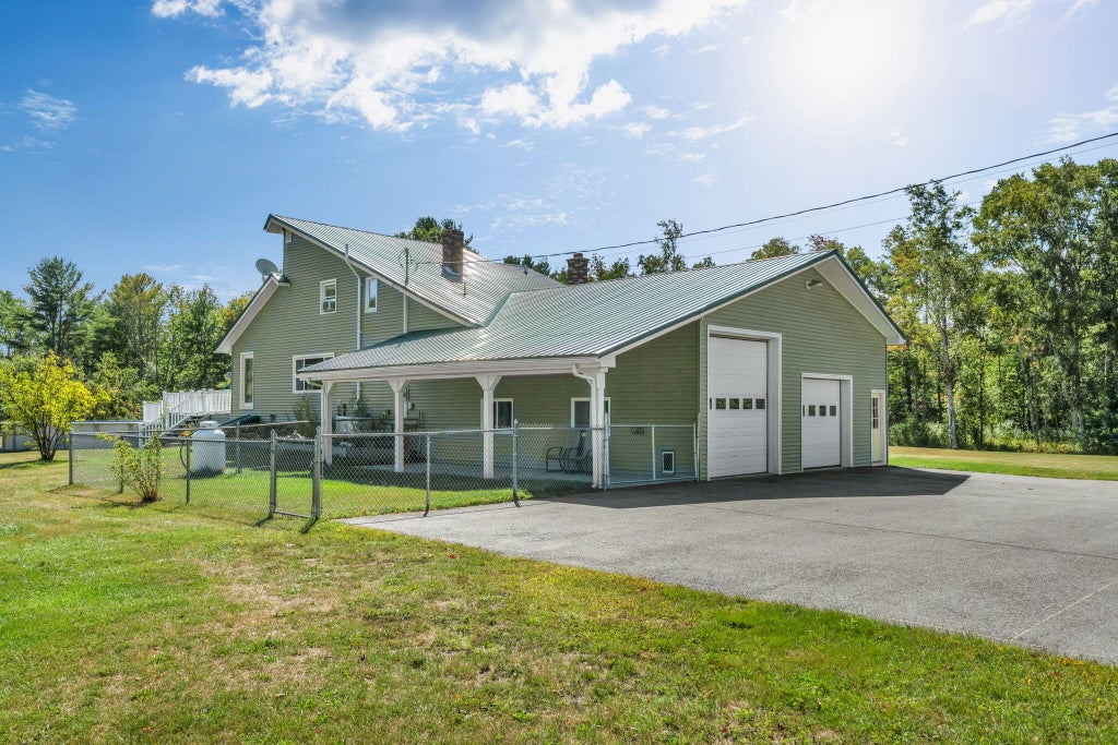 Photo of 47 Higgins Road, Palmyra, ME 04965 (MLS # 1680264)