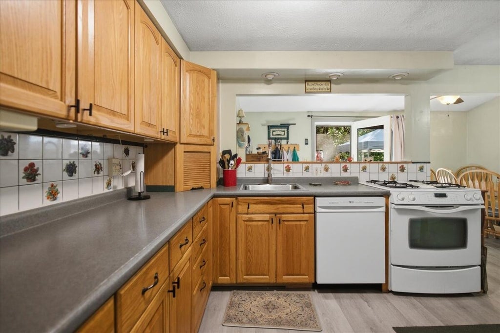Photo of 8 Higgins Street, Lisbon, ME 04252 (MLS # 1680048)