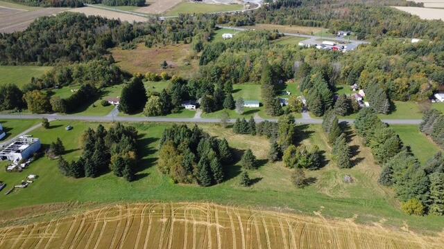 Photo of 52 Sawyer Road #South Half, Limestone, ME 04750 (MLS # 1683529)