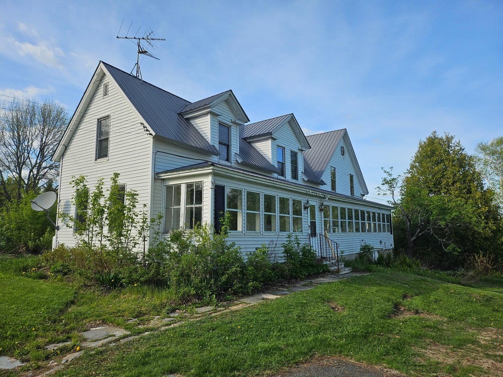 Photo of 242 Maple Grove Road, Fort Fairfield, ME 04742 (MLS # 1667001)
