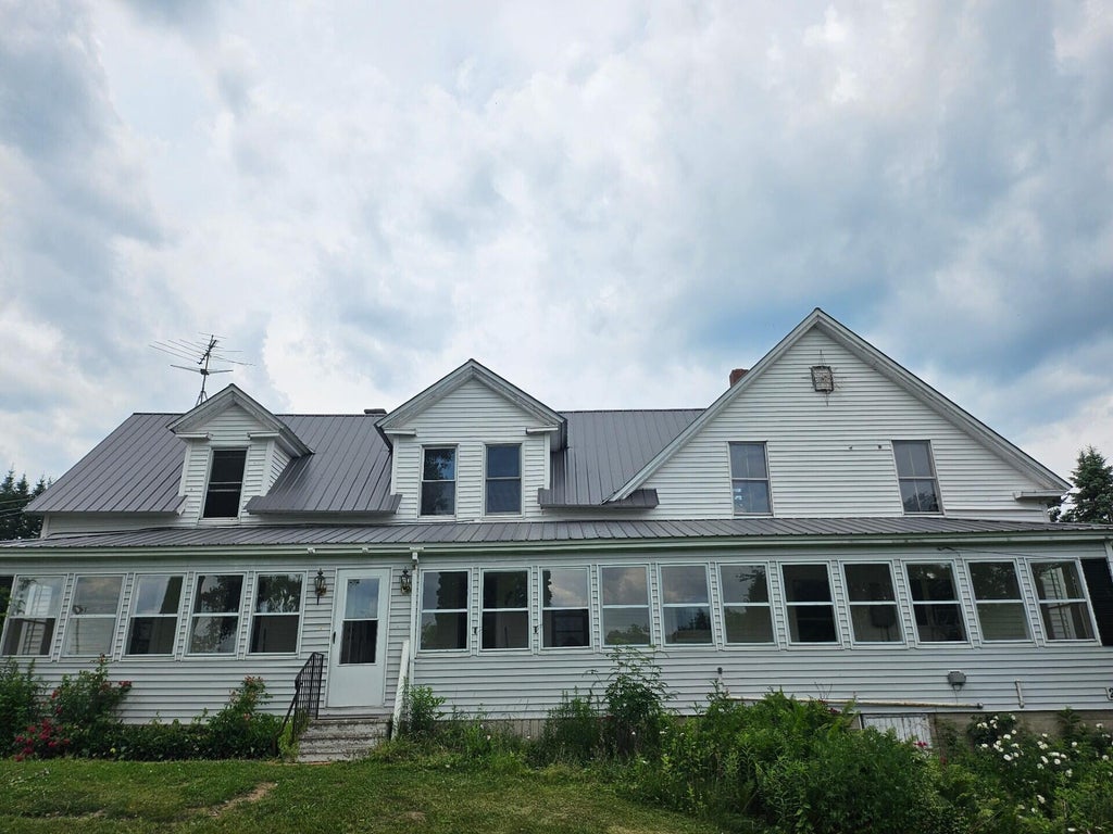 Photo of 242 Maple Grove Road, Fort Fairfield, ME 04742 (MLS # 1667001)
