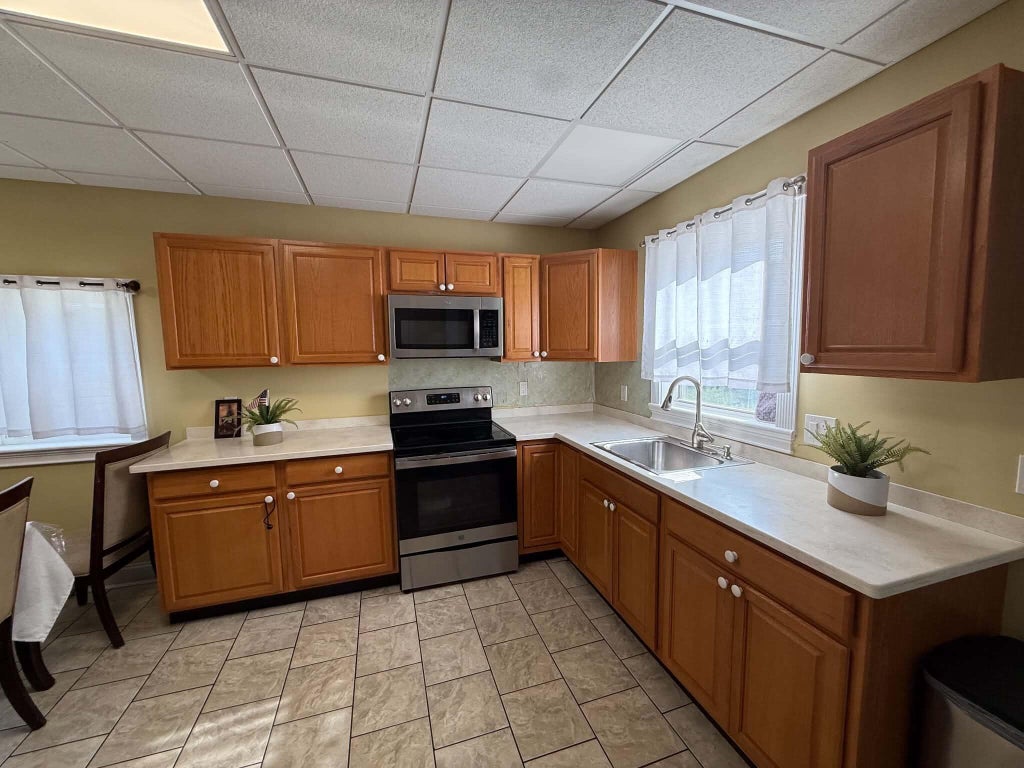 Photo of 651 Pleasant Street, Lewiston, ME 04240 (MLS # 1679590)