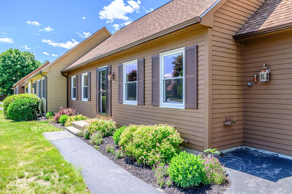 Photo of 17 Old Carriage Road #10, Auburn, ME 04210 (MLS # 1668186)