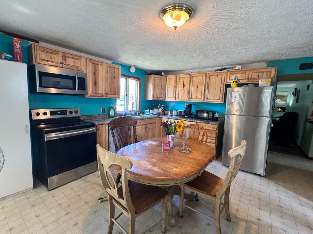 Photo of 6 Holy Family Street, Lewiston, ME 04240 (MLS # 1671487)