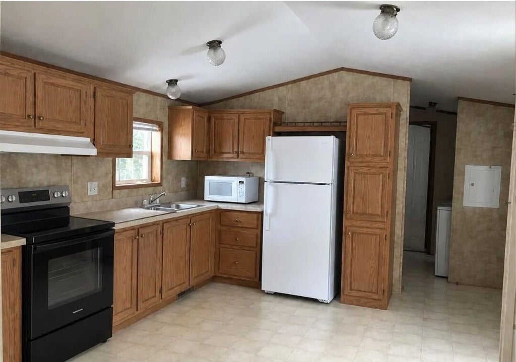 Photo of 63 Village Green Road, Waterville, ME 04901 (MLS # 1685084)