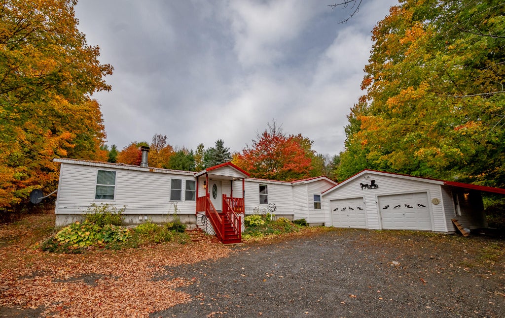 Photo of 953 Milo Road, Sebec, ME 04481 (MLS # 1684107)