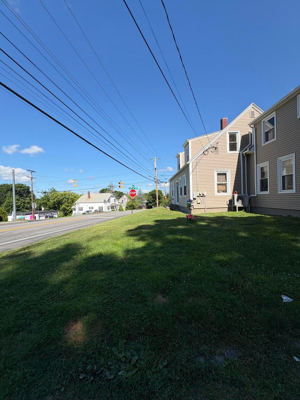 Photo of 42 Pleasant Street, Lewiston, ME 04240 (MLS # 1672435)