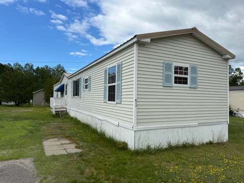 Photo of 413 Kelley Mobile Homes Park, Millinocket, ME 04462 (MLS # 1668273)