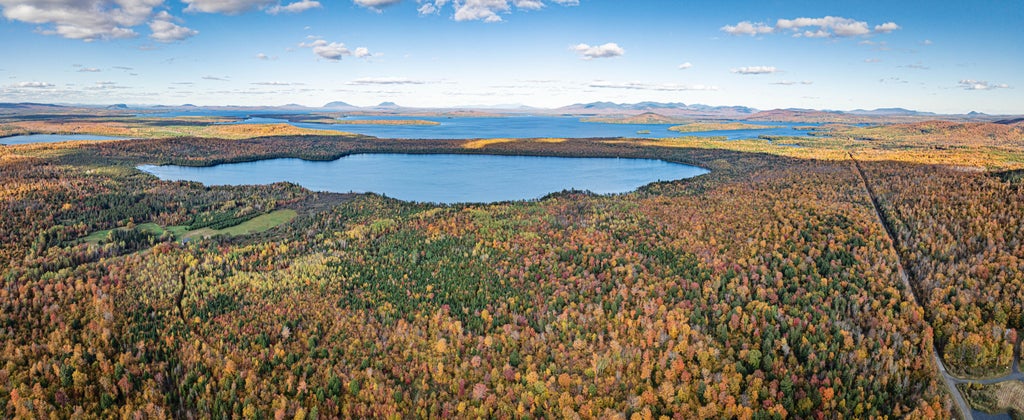 Photo of 447 ski resort Road, Big Moose Twp, ME 04442 (MLS # 1608055)
