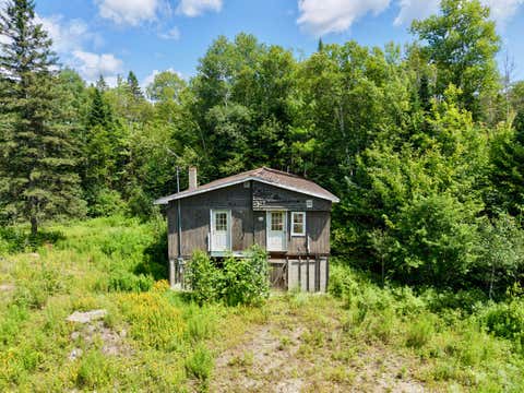 Photo of 58 Clark Brook Road, Wallagrass, ME 04781 (MLS # 1674403)