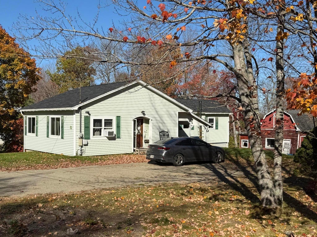 Photo of 19 Pinkham Street, Lincoln, ME 04457 (MLS # 1684824)