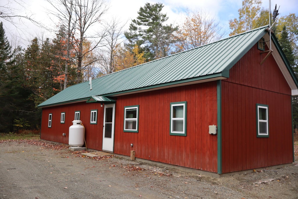 Photo of 86 McKenney Road, Parkman, ME 04443 (MLS # 1683388)