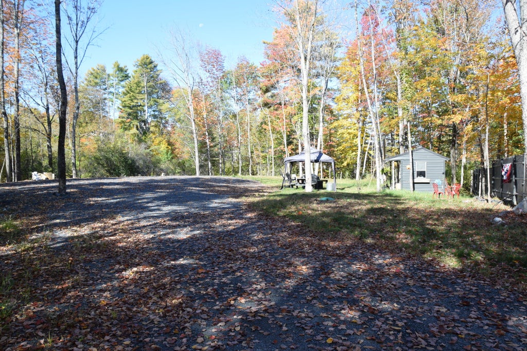 Photo of 64 Mill Road, Embden, ME 04958 (MLS # 1682886)