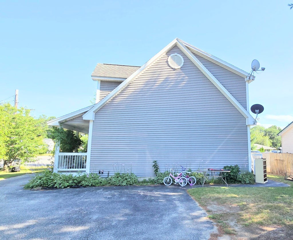 Photo of 71 Grove Street, Lewiston, ME 04240 (MLS # 1673556)