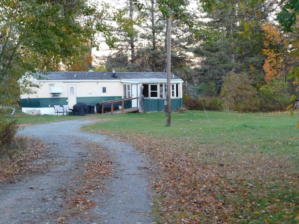 Photo of 7 Embden Pond Road, Anson, ME 04958 (MLS # 1684912)
