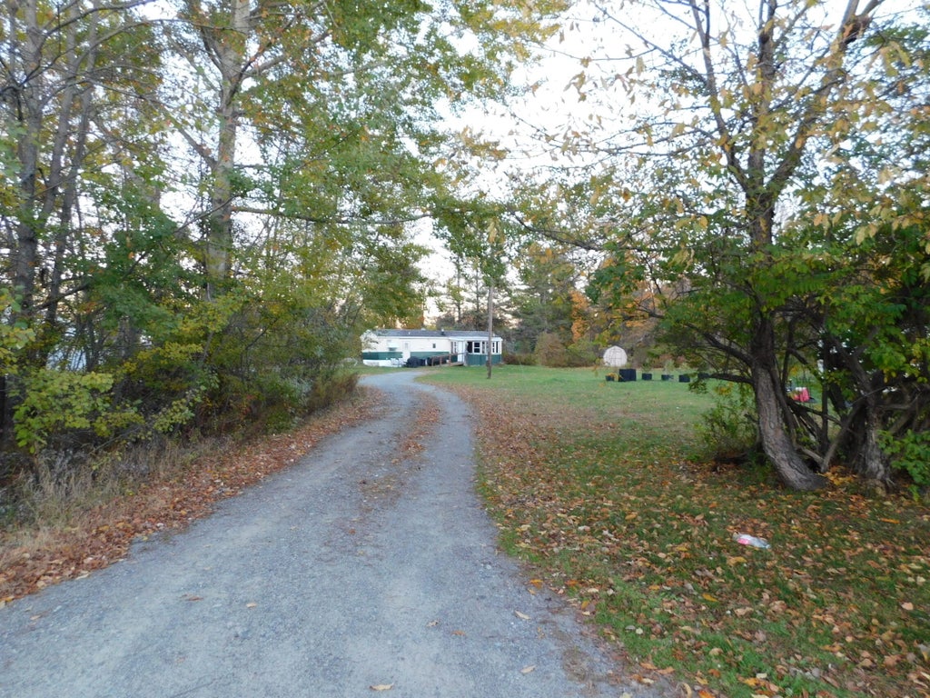 Photo of 7 Embden Pond Road, Anson, ME 04958 (MLS # 1684912)