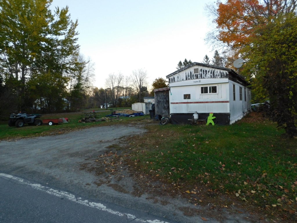 Photo of 7 Embden Pond Road, Anson, ME 04958 (MLS # 1684912)