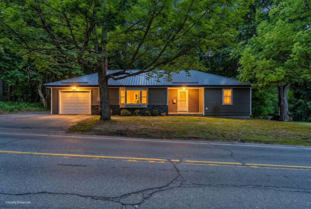 Photo of 71 Enfield Road, Lincoln, ME 04457 (MLS # 1674395)