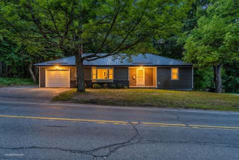 Photo of 71 Enfield Road, Lincoln, ME 04457 (MLS # 1674395)