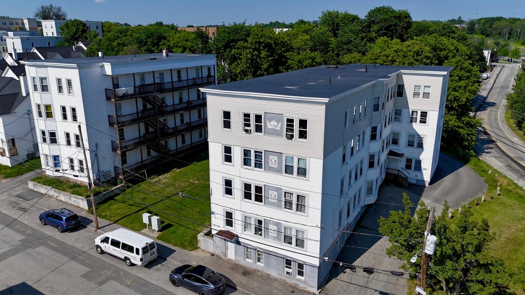Photo of 94 /102-104 Knox St / 151 Oxford Street, Lewiston, ME 04240 (MLS # 1681546)