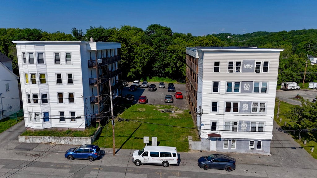 Photo of 94 /102-104 Knox St / 151 Oxford Street, Lewiston, ME 04240 (MLS # 1681546)