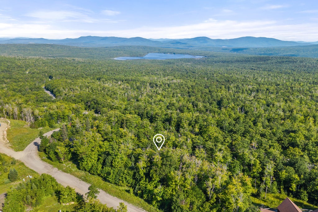Photo of 77 Magalloway Loop, Sandy River Plt, ME 04970 (MLS # 1674825)