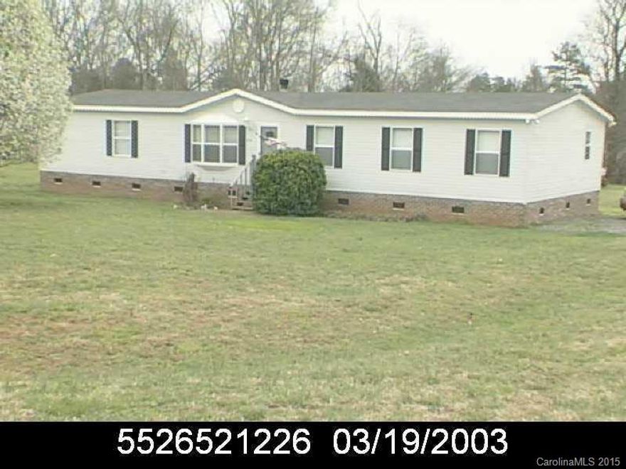 Well kept mobile home with large yard.  Tenant occupied.