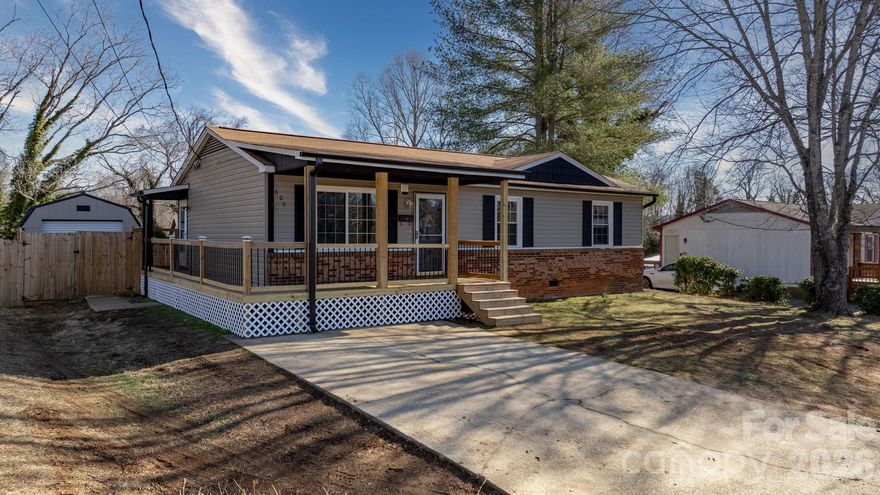 Welcome home to this beautifully updated 3-bedroom, 1-bath residence offering 1,075 square feet of comfortable living space. Recent upgrades make this home truly move-in ready! Step inside to find stunning engineered hardwood floors flowing throughout the home. The upgraded kitchen features modern cabinetry, providing both style and functionality for everyday living and entertaining. The renovated bathroom includes a newer stand-up shower and elegant stone countertop for a clean, contemporary feel. Enjoy outdoor living with a fully fenced backyard offering excellent privacy, plus a concrete patio perfect for grilling and gatherings. Relax on the covered front porch an ideal spot for morning coffee or evening unwinding. A spacious storage building is also included and may convey with the right offer, adding even more value and versatility. Conveniently located just minutes from downtown, this home combines charm, updates, and location and is ready for its next owner!