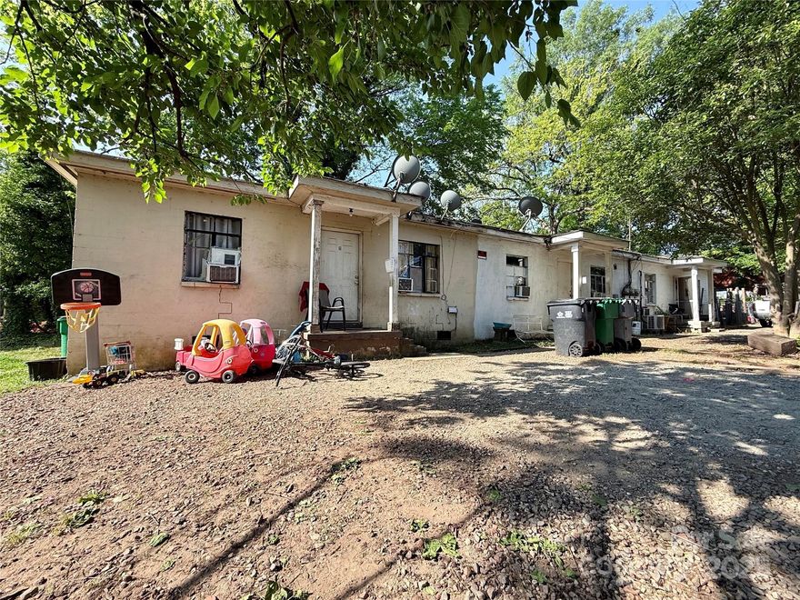 This TRIPLEX sits in a great location just steps away from the CityLynx Gold Line streetcar station in The Historic West End’s Biddleville neighborhood.  This property is ready for its next chapter and has numerous possibilities.  Renovate the current building, do an addition, or tear down and start new!  Separate utilities.  Two of the three units are currently rented.  Please do not disturb tenants.  Sold AS-IS.