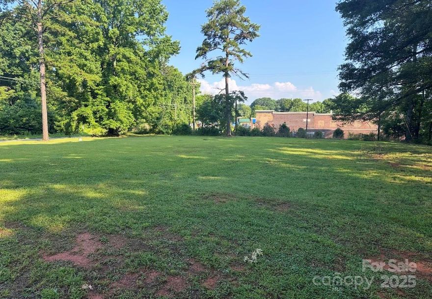 Exceptional  flat lot with commercial zoning, ideally located adjacent to Walmart on bustling HWY 160. Surrounded by thriving businesses and high daily traffic, this property offers outstanding visibility and accessibility in one of the area’s most sought-after locations. Perfect for retail, office, or service development. Small garage located on the property