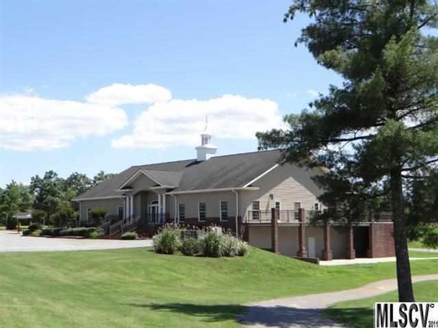 Building lot in Lakefront community with lake access and Golf. Water & sewer available at street.