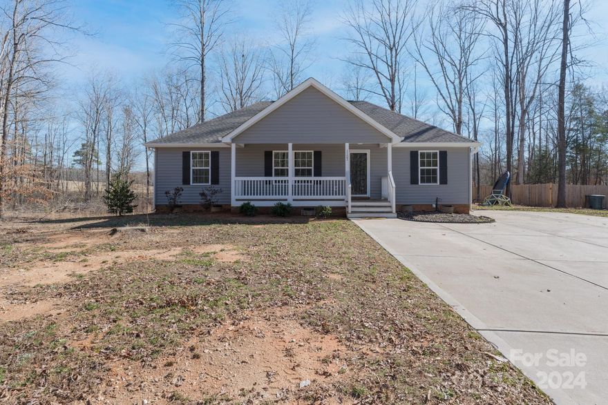Looking for a quiet life in the country? This three bedroom, two bath home could be the one for you. Located on almost an acre lot and built in 2021, this quaint home features laminate plank flooring, granite countertops, and stainless appliances. Enjoy relaxing on the front covered porch with your morning coffee or take in the view each evening on your back deck. Come see all this home has to offer you!