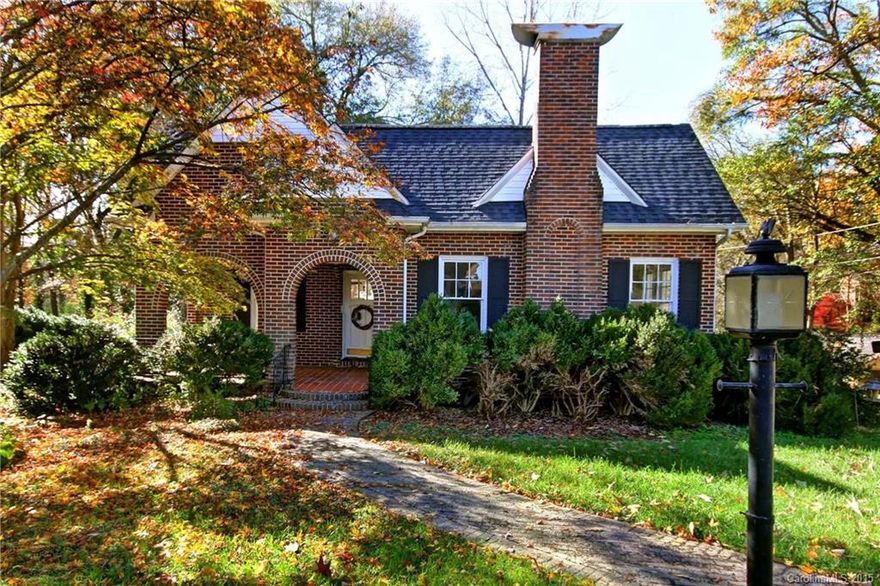 Charming all brick cottage in a highly desirable neighborhood, close to downtown Lincolnton & the country club.  Move-in ready w/wood floors throughout, fresh paint, newly renovated bathroom (including plumping through out). The first thing you notice about this home is a storybook front porch w/a swing & arches. Peaceful, scenic neighborhood is great.  Main level 3 Bedrooms, 1 bath, large eat-in kitchen, living room & dining room.  Lower level garage & lots of room for storage