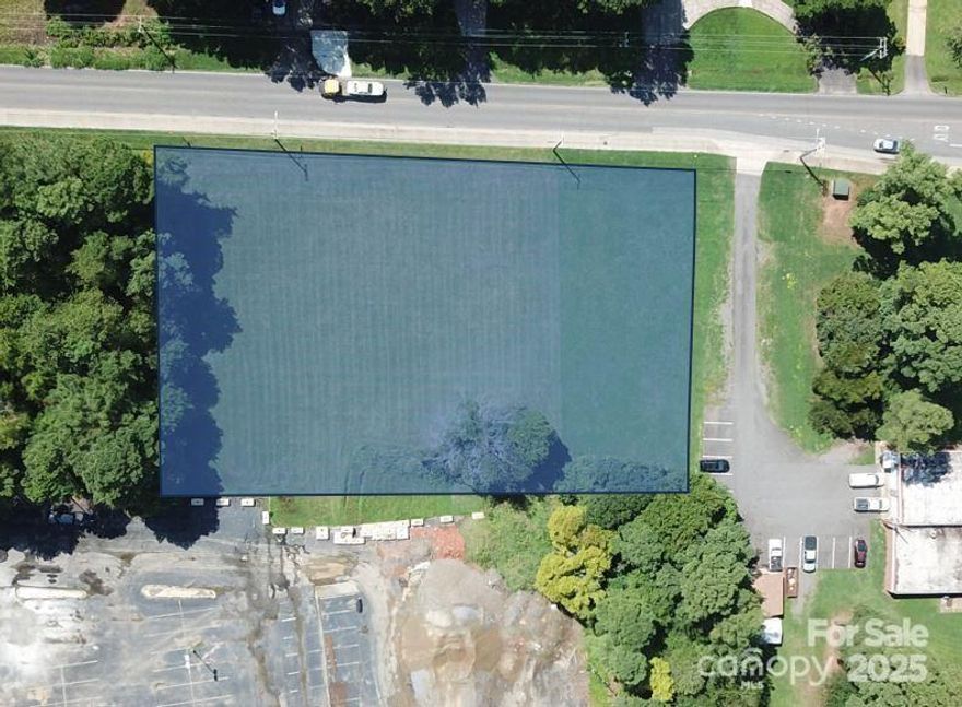 Commercial lot zoned OI behind the old AMC Movie Theater in Rock Hill.   The old AMC theater has been redeveloped into Commercial Flex space.  Owner is willing to do owner financing with 25% down.    Owner can also build to suit your needs if you'd prefer.